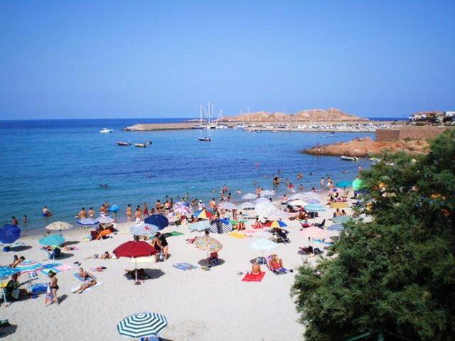 Tanca Della Torre Trilocale Vista Mare Appartement Isola Rossa Buitenkant foto
